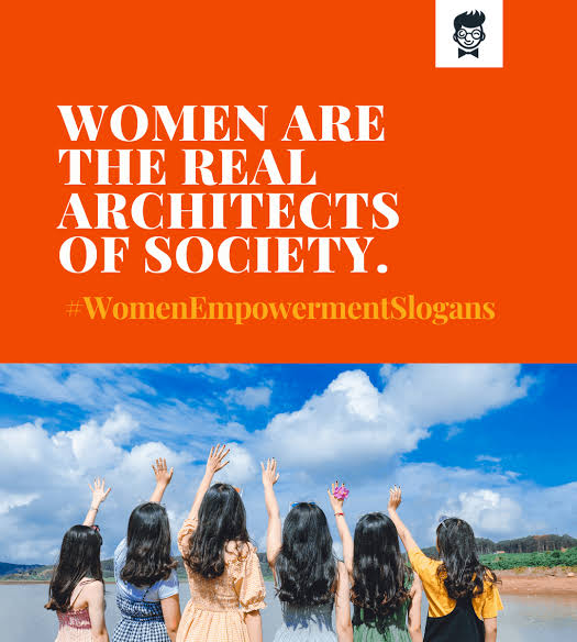 Women raising their hands at a rally